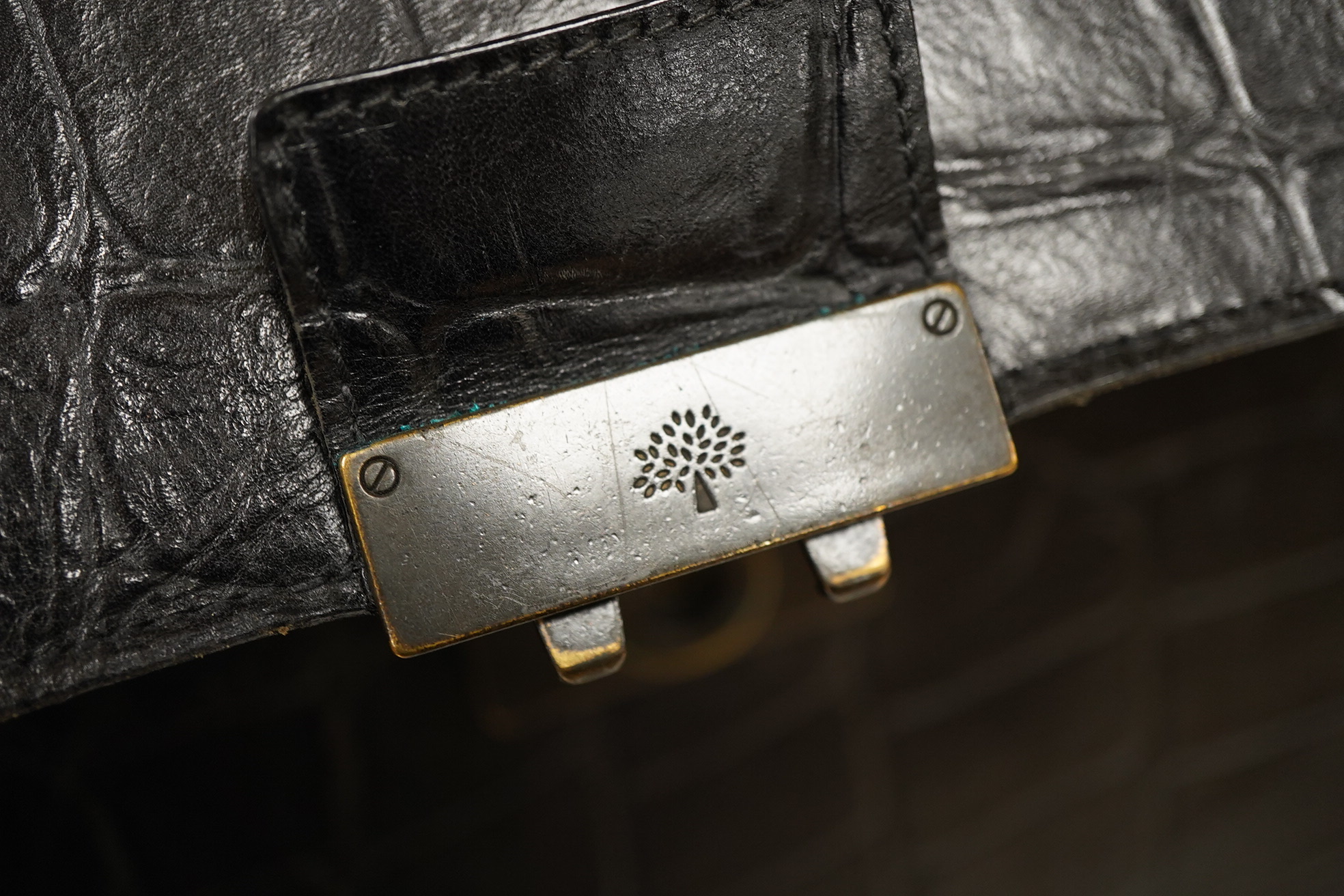 A faux crocodile black Mulberry briefcase, strap and dust cover, 41.5cm wide x 31cm high x 10cm deep at base. Condition - slightly rubbed on edges, needs a polish and lining cleaned